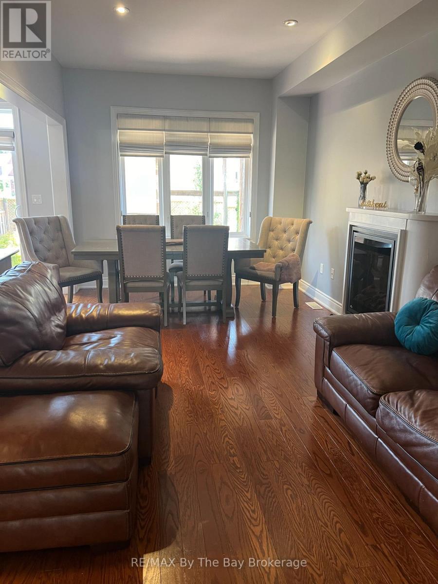46 Sandy Coast Crescent, Wasaga Beach, ON - Indoor Photo Showing Living Room With Fireplace