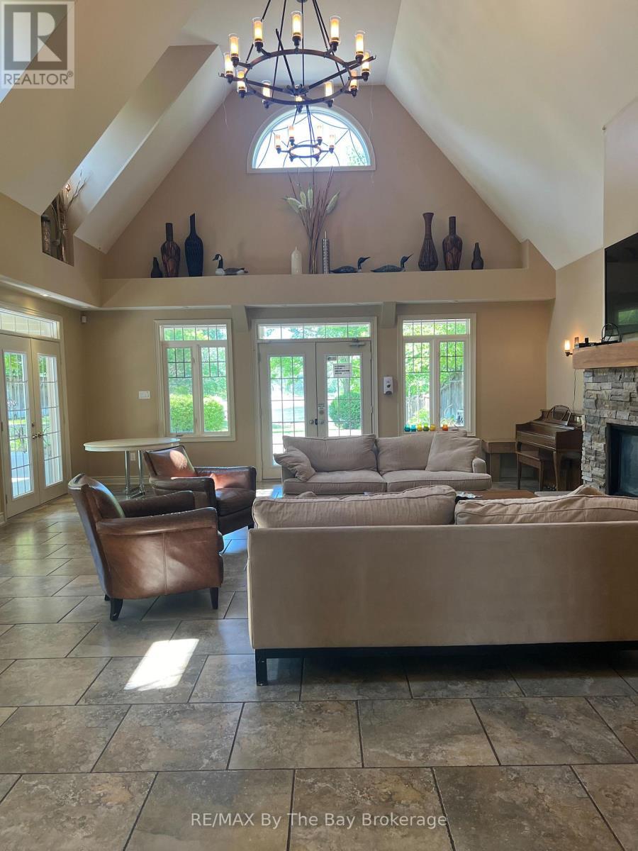 46 Sandy Coast Crescent, Wasaga Beach, ON - Indoor Photo Showing Living Room With Fireplace