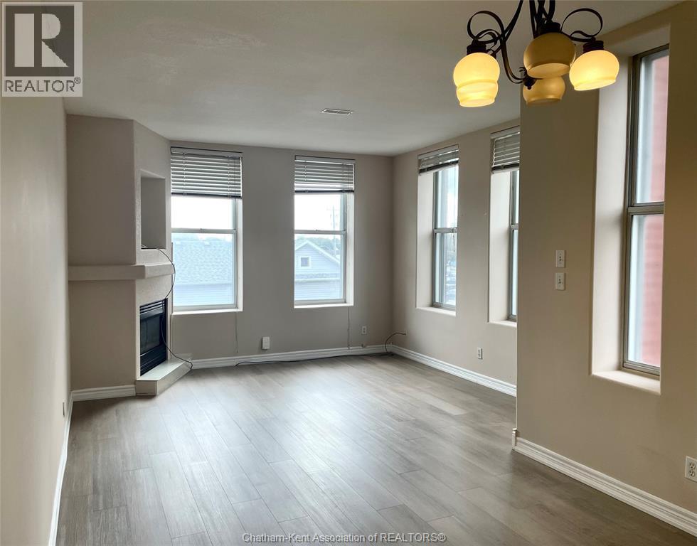 317 Queen Street Unit# 301, Chatham, ON - Indoor Photo Showing Other Room With Fireplace