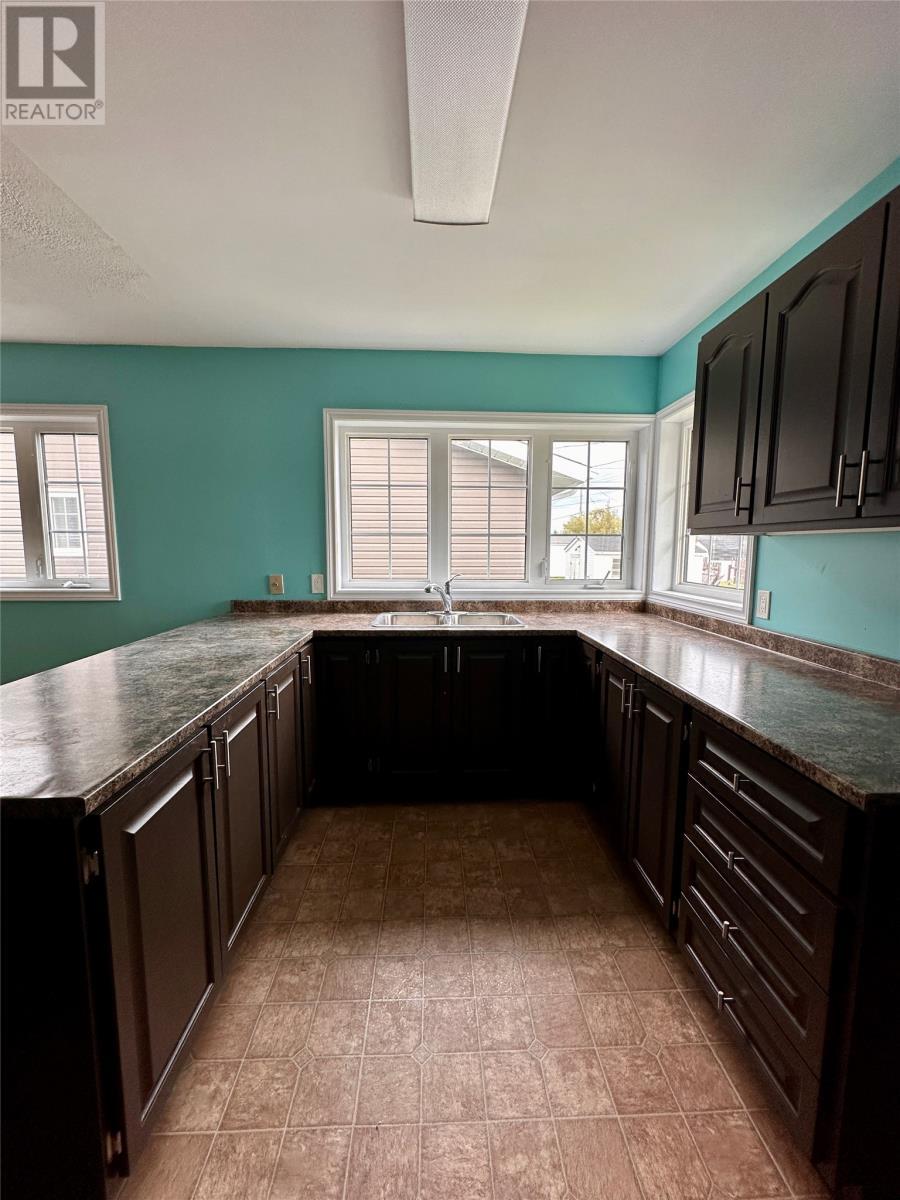 7 Courtney Street, Grand Bank, NL - Indoor Photo Showing Kitchen With Double Sink