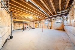 Unfinished basement featuring a sink -