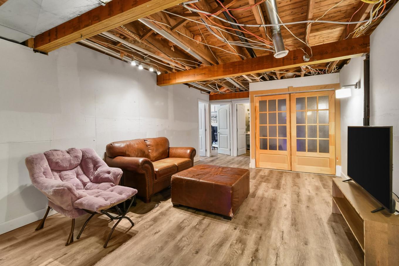 Family room - 165 Rue Evelyn, Longueuil (Greenfield Park), QC - Indoor Photo Showing Basement