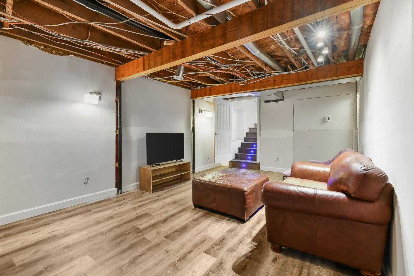 Family room - 165 Rue Evelyn, Longueuil (Greenfield Park), QC - Indoor Photo Showing Basement