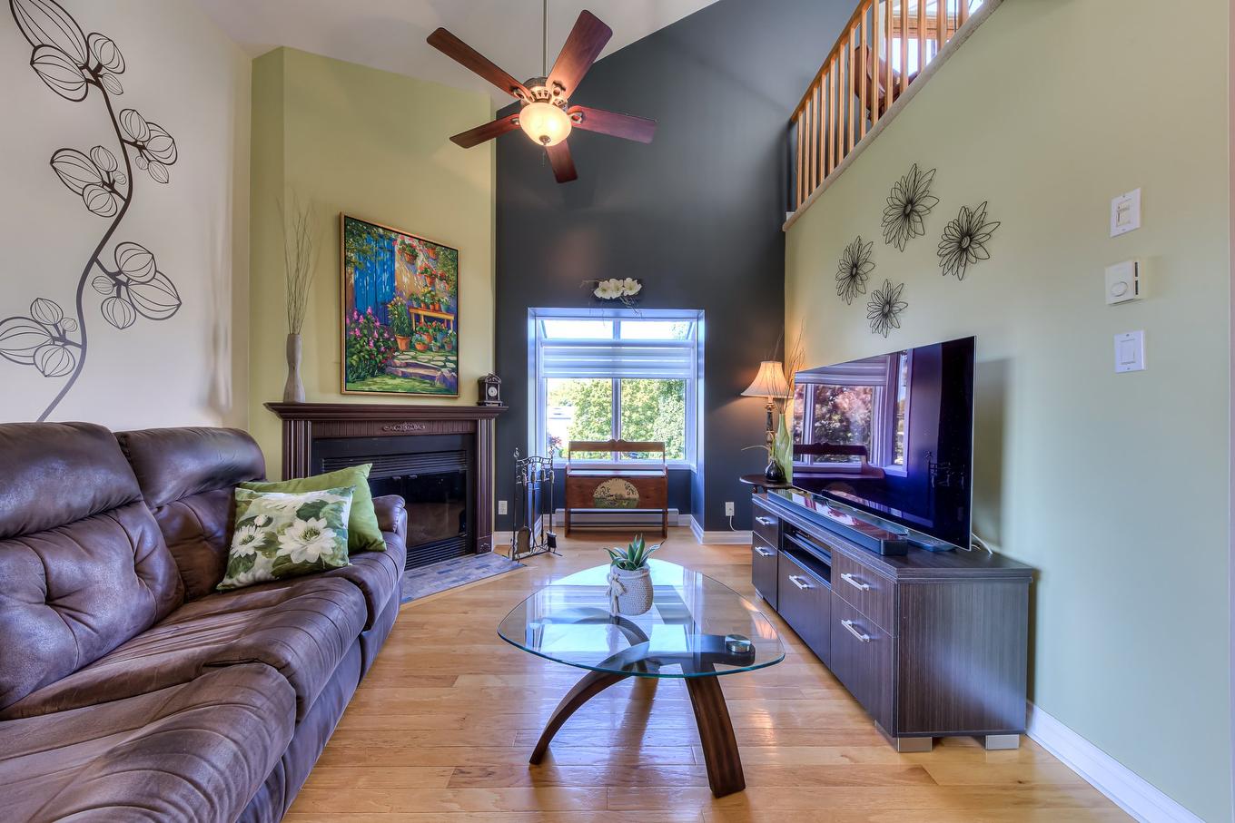 Living room - 1424 Rue Des Hirondelles, Longueuil (Le Vieux-Longueuil), QC - Indoor Photo Showing Living Room With Fireplace