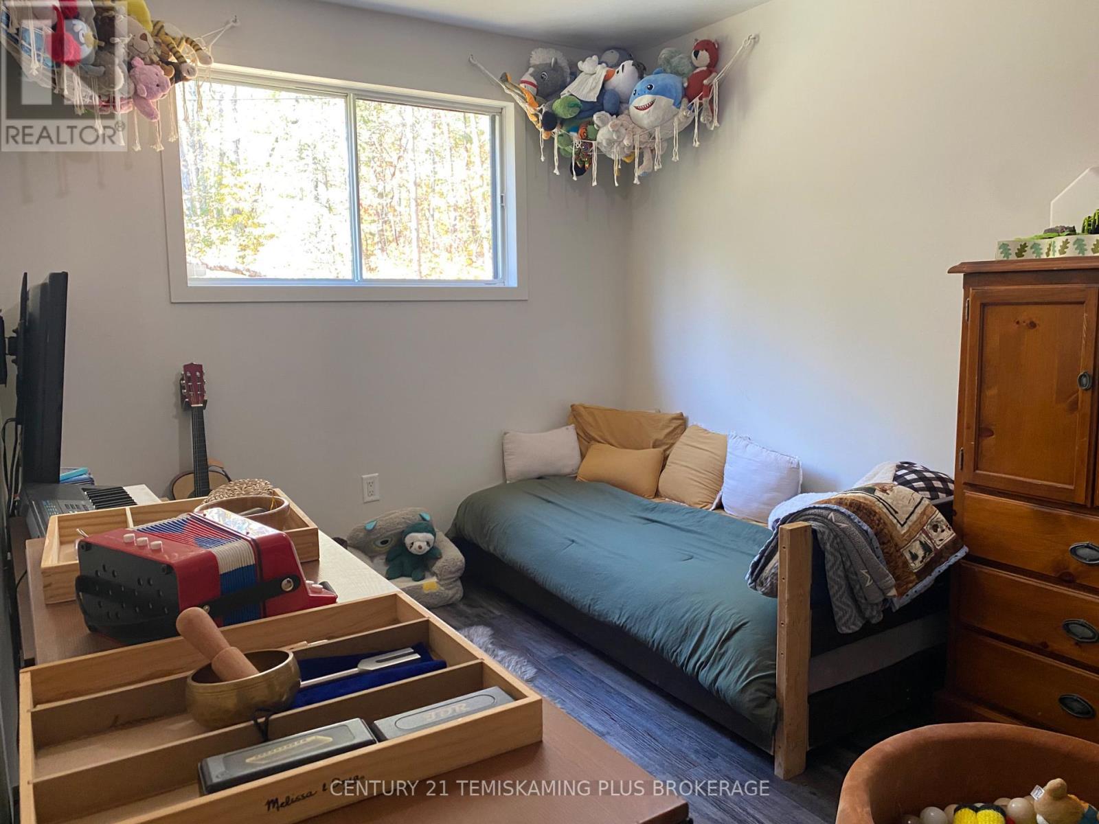 466609 Kerr Lake Road, Timiskaming (Tim - Outside - Rural), ON - Indoor Photo Showing Bedroom