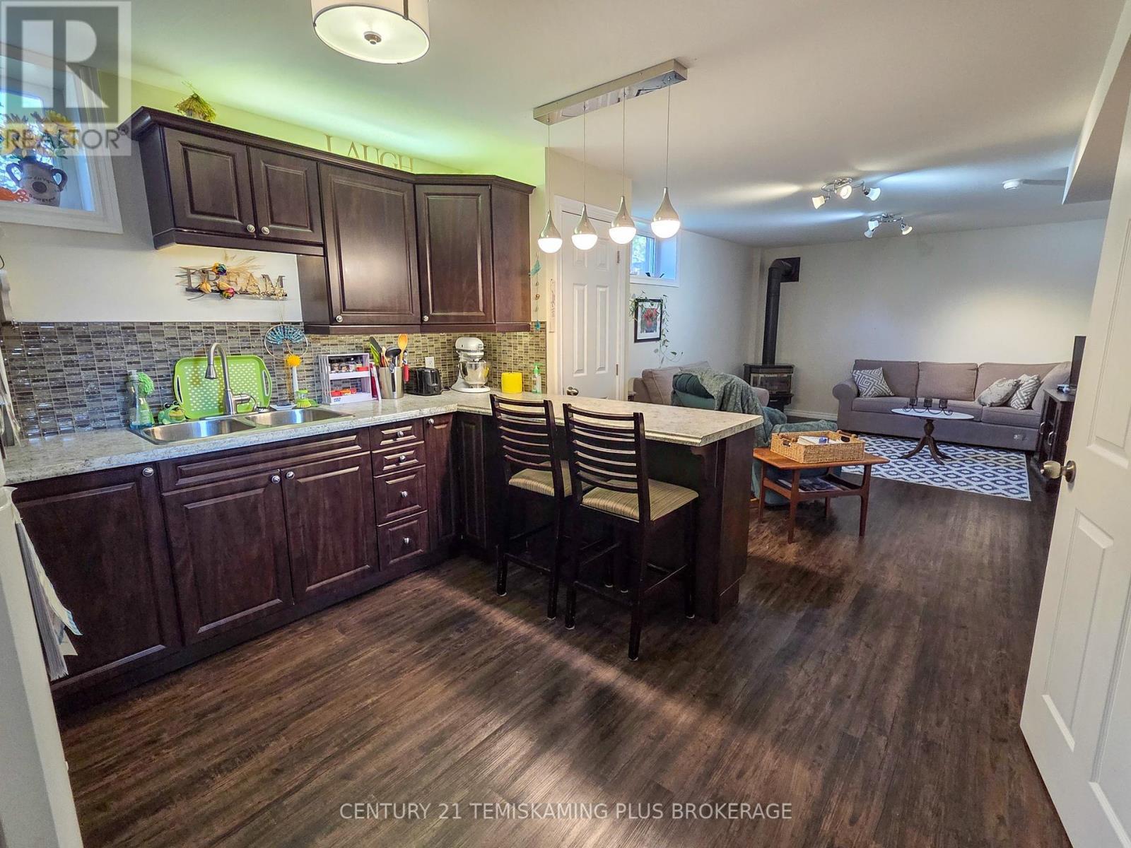 Basement Unit Kitchen - 47 Eighth Avenue, Englehart, ON - Indoor Photo Showing Kitchen With Double Sink