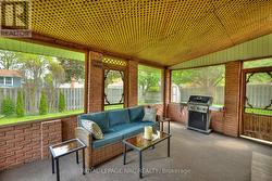 Sunroom thru sliders in family room -