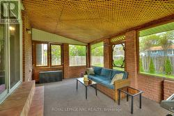 Sunroom thru sliders in family room -