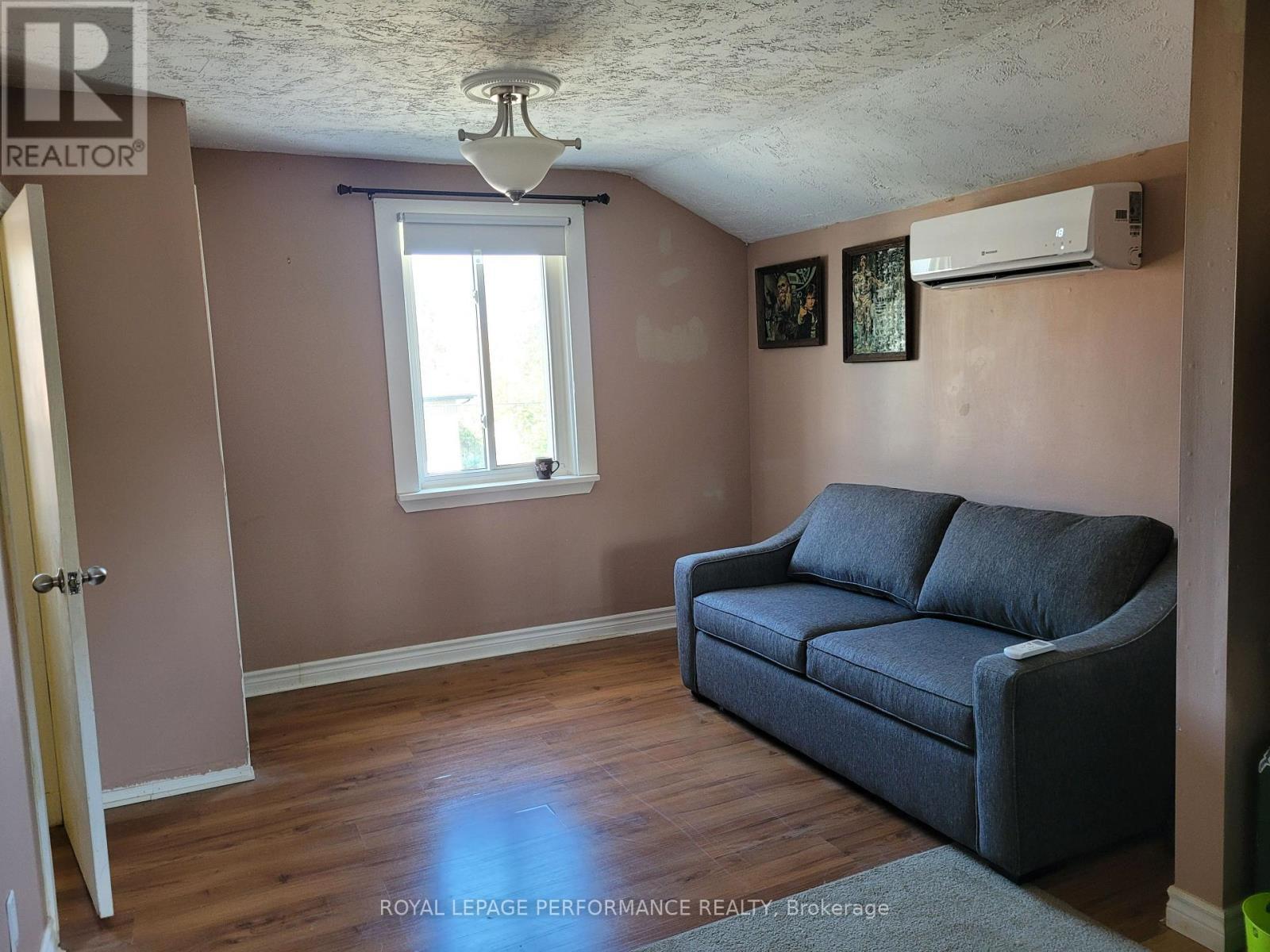 Large bedroom, note the heat pump on the wall. - 975 Queen Street, Champlain, ON - Indoor