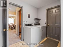 Main level laundry, direct garage accessStairs to -