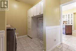 Laundry room with exterior dooside entrance -