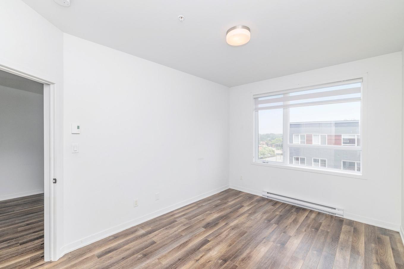 Chambre à coucher principale - 806-740 Av. Victoria, Saint-Lambert, QC - Indoor Photo Showing Other Room