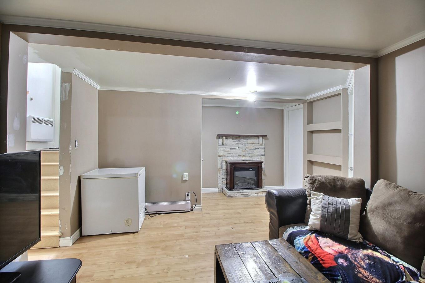 Living room - 1575 Route De St-Philippe, Val-D'Or, QC - Indoor With Fireplace