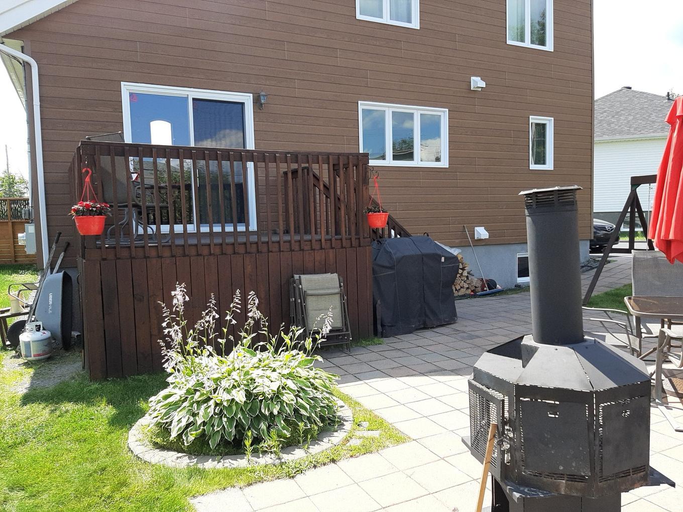 Back facade - 289 Rue Miljours, Val-D'Or, QC - Outdoor With Deck Patio Veranda With Exterior