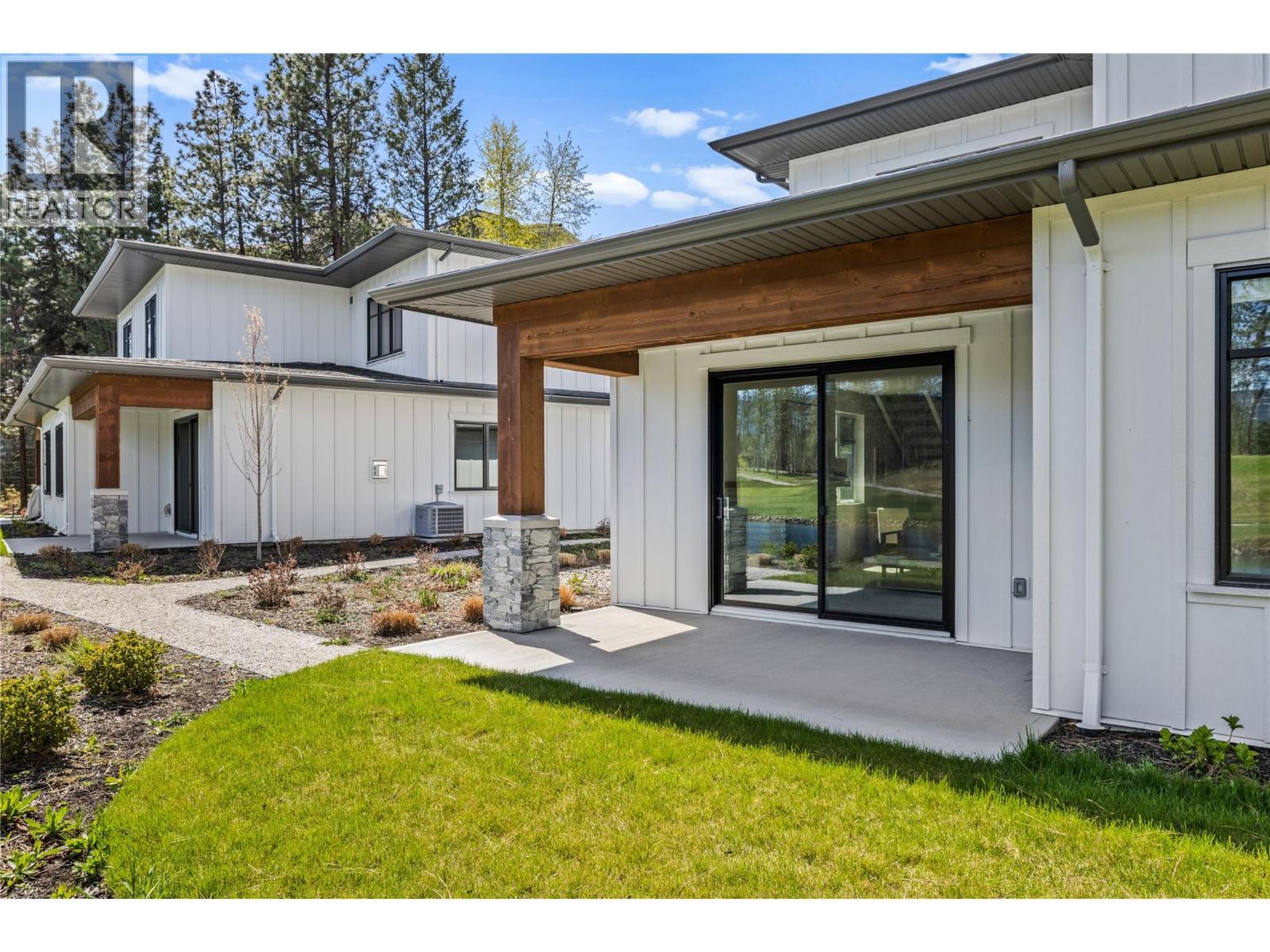 Patio - Photo of a similar home in the community. - 1979 Country Club Drive Unit# 6, Kelowna, BC - Outdoor