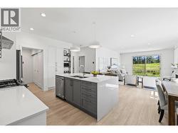 Kitchen - Photo of a similar home in the community. -