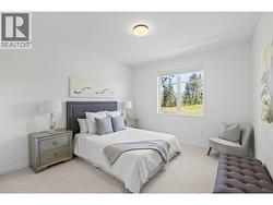 Second bedroom - Photo of a similar home in the community. -