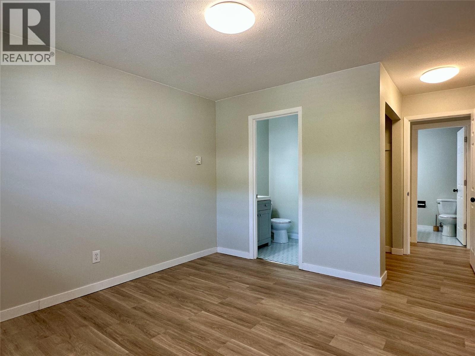 Primary Bedroom with Ensuite - 3505 38 Street Unit# 215, Vernon, BC - Indoor Photo Showing Other Room