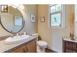 Powder room on the main level - granite counters -