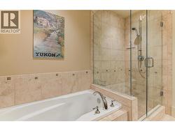 Primary ensuite - tile/glass shower and tub -