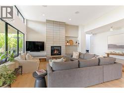 Wall of windows overlooking the patio floods this space with natural lighting -
