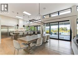 Oversized sliding doors to the pool and patio for effortless indoor outdoor entertaining -