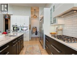 Dual ovens, and 5 burner stove top -