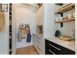 Ample storage in the walk in and butler style pantry. -