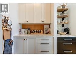 Coffee station with floating wood shelves. -