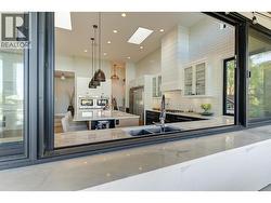 Marble counter outside sliding glass window passthrough -