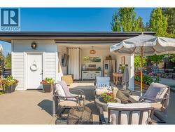 Pool Cabana with roll out awning plus storage room and just steps to a three piece bathroom -