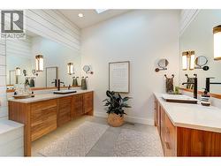 Light filled ensuite with skylights and dual vanities -