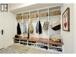 A wall of integrated cabinets keeps the space organized and tidy. -