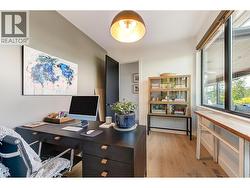 Home office or den with front yardscape views -