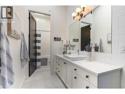 Jack & Jill bathroom with door separating shower/tub and toilet for extra privacy -