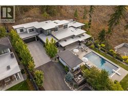 Long paved driveway with lots of extra parking as well as a spot for your RV/boat -