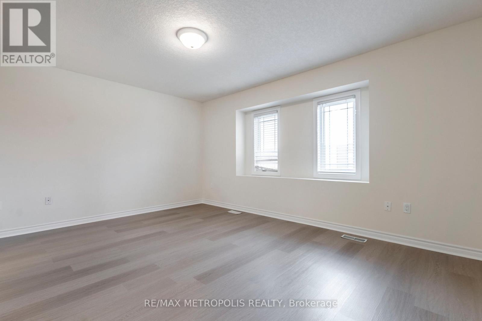 C16 - 619 Wild Ginger Avenue, Waterloo, ON - Indoor Photo Showing Other Room