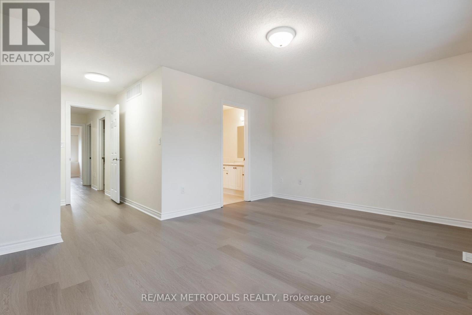 C16 - 619 Wild Ginger Avenue, Waterloo, ON - Indoor Photo Showing Other Room