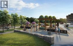 View of property's community featuring a pergola, a patio, and a lawn -