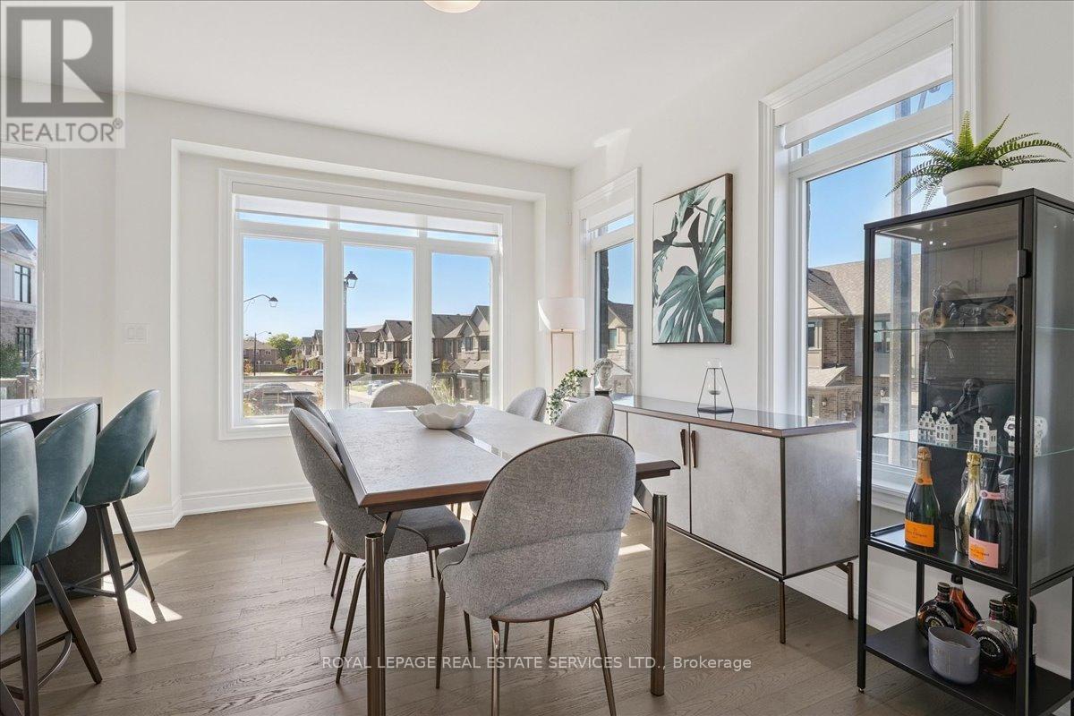 Large windows - 2180 Postmaster Drive, Oakville, ON - Indoor Photo Showing Dining Room