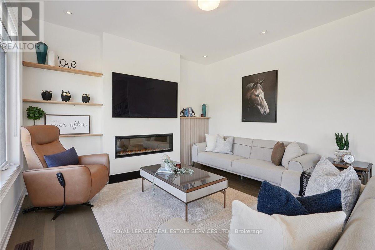 2180 Postmaster Drive, Oakville, ON - Indoor Photo Showing Living Room With Fireplace