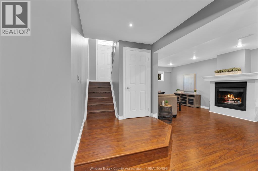 262 Columbus Drive, Lakeshore, ON - Indoor Photo Showing Other Room With Fireplace