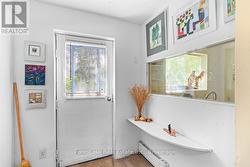 Second main level entryway at front of house -