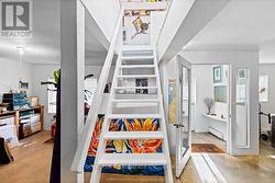 Central staircase to Gallery Loft -