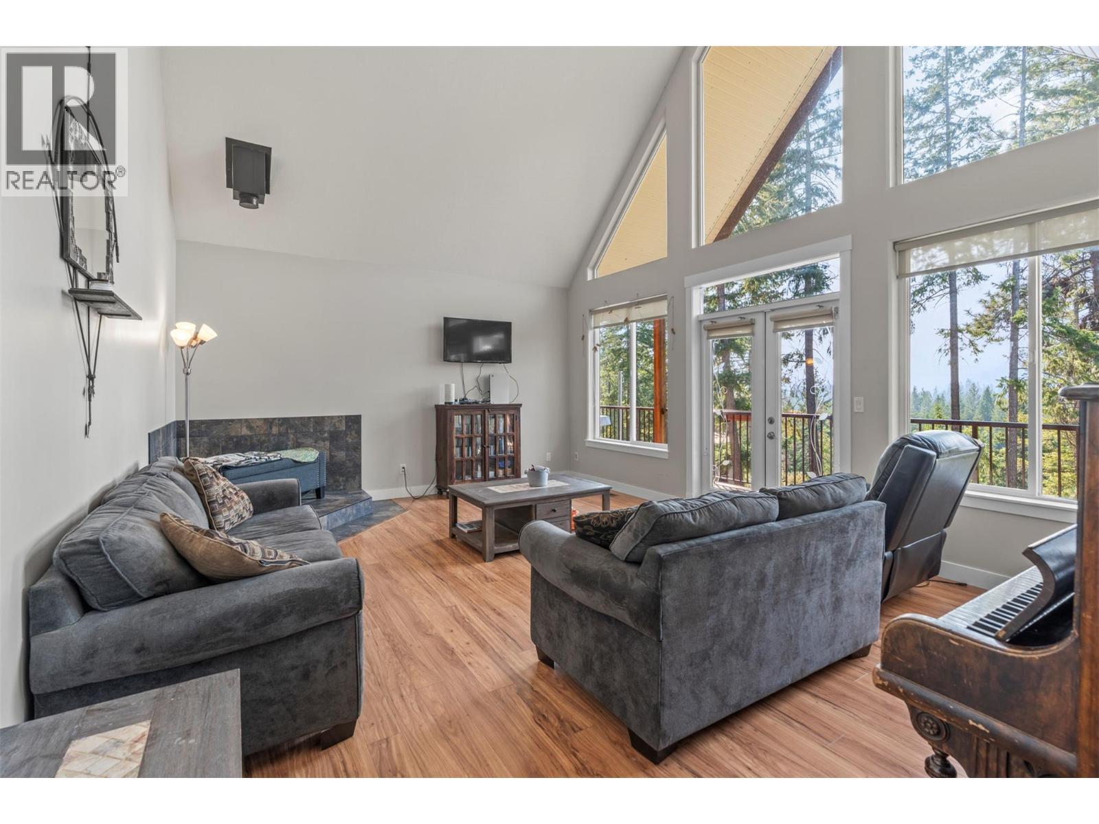 1951 Wolfgang Road, Armstrong, BC - Indoor Photo Showing Living Room With Fireplace