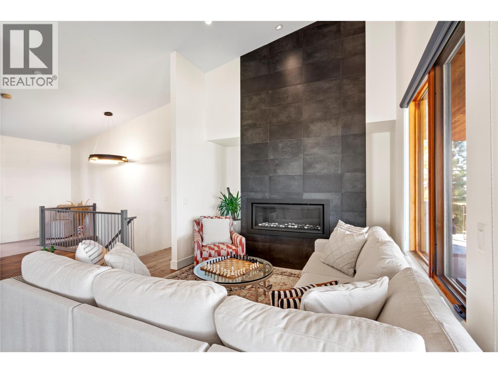 2750 Workman Place, Naramata, BC - Indoor Photo Showing Living Room With Fireplace