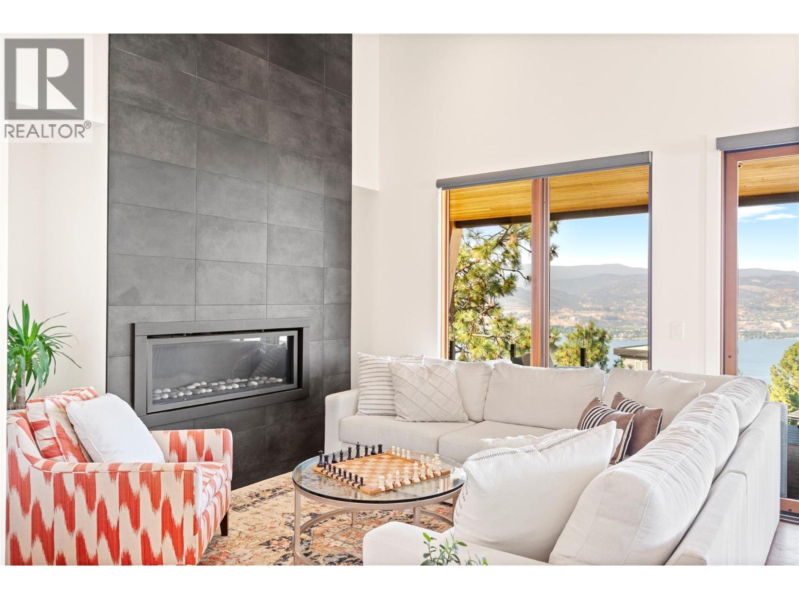 2750 Workman Place, Naramata, BC - Indoor Photo Showing Living Room With Fireplace