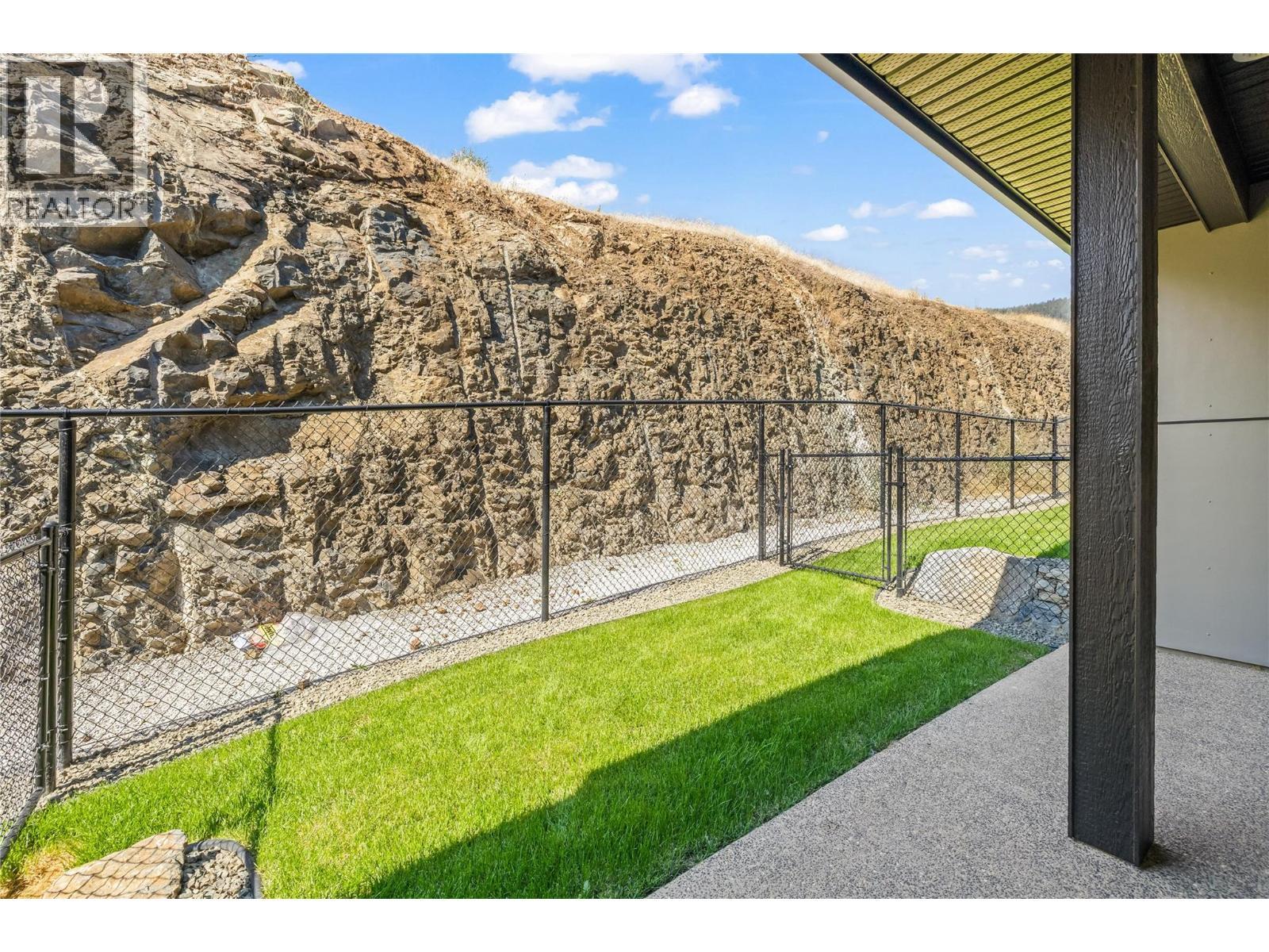 Backyard and deck off the main floor - 2835 Canyon Crest Drive Unit# 17, West Kelowna, BC - Outdoor