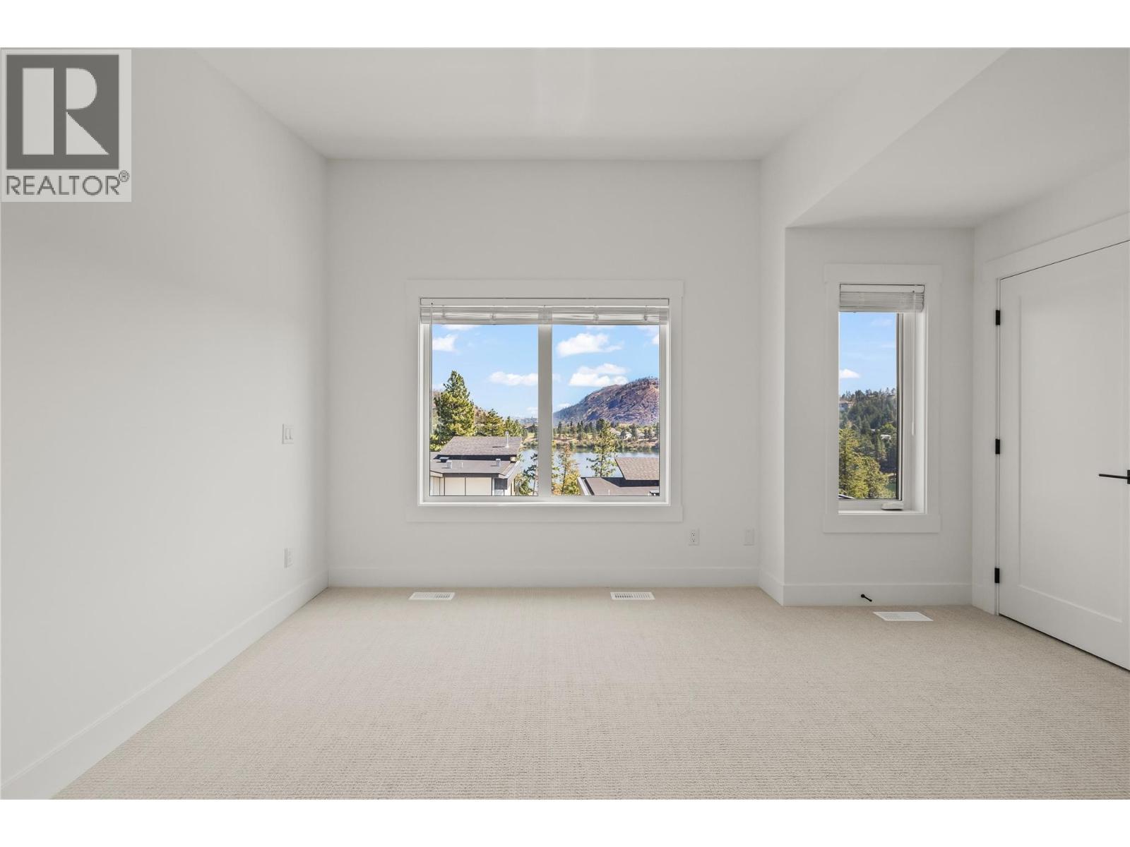 Primary Bedroom (upper level) - 2835 Canyon Crest Drive Unit# 17, West Kelowna, BC - Indoor Photo Showing Other Room