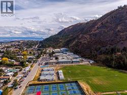 ""Just blocks away from elementary, middle and secondary schools. Sports fields, pickle ball courts, hockey arena and hiking trails."" -